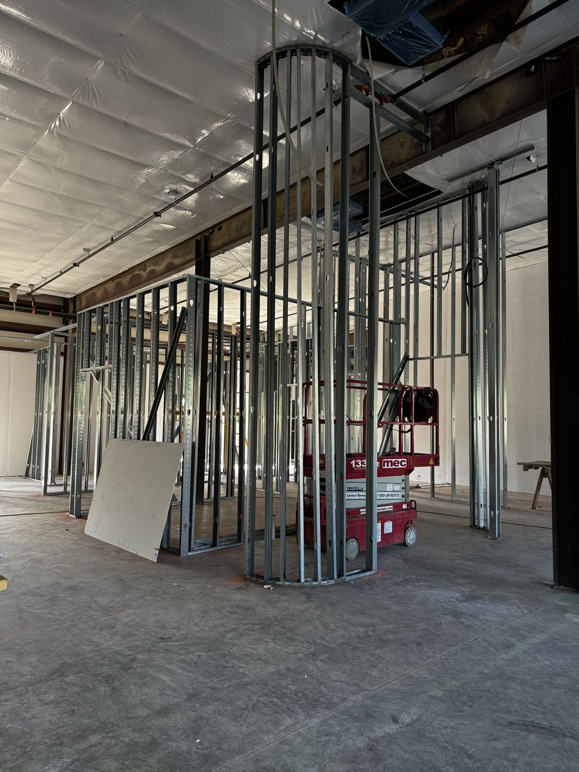 Commercial interior buildout — curved steel-stud framing