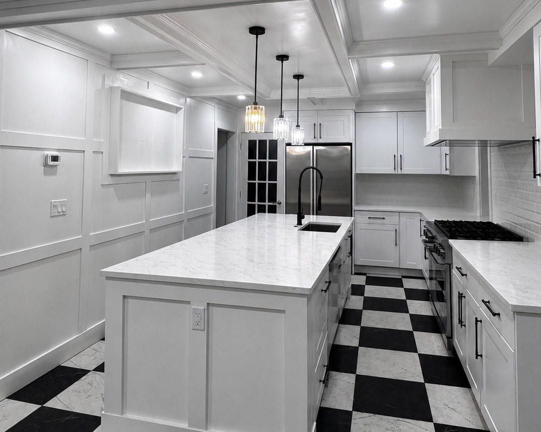 Finished custom kitchen — coffered ceiling, marble waterfall island, checkerboard floor
