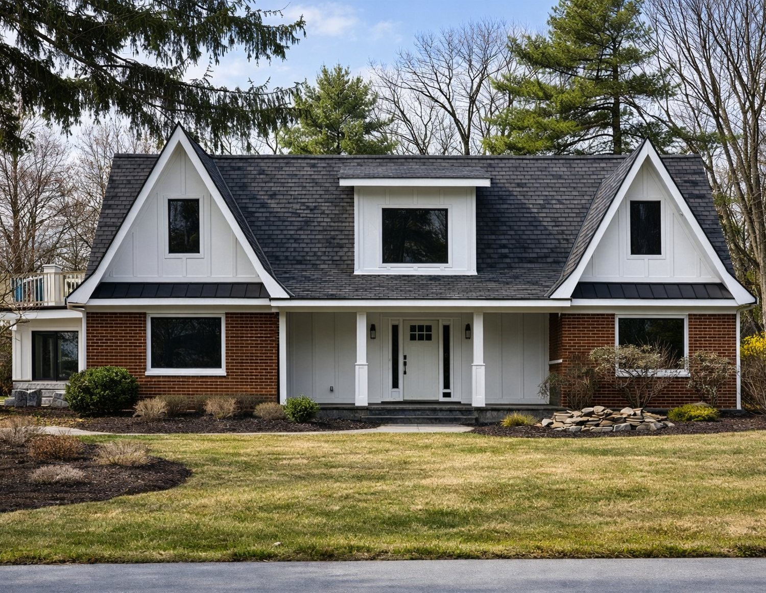 Finished custom home exterior — brick and board-and-batten facade